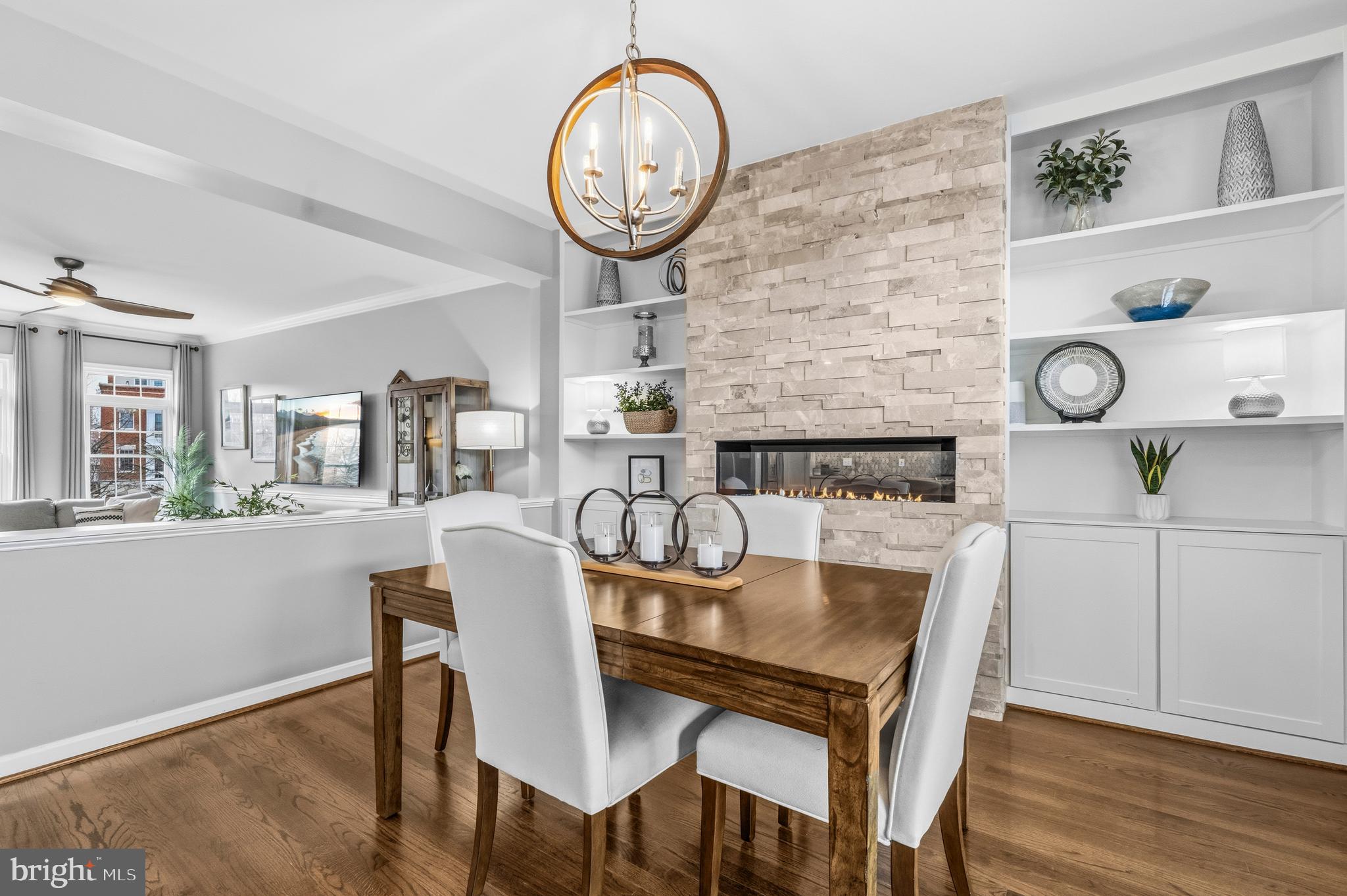 12138 Chancery Station Circle Reston, VA 20190 - Photo 16 of 54 a view of a dining room with furniture and wooden floor