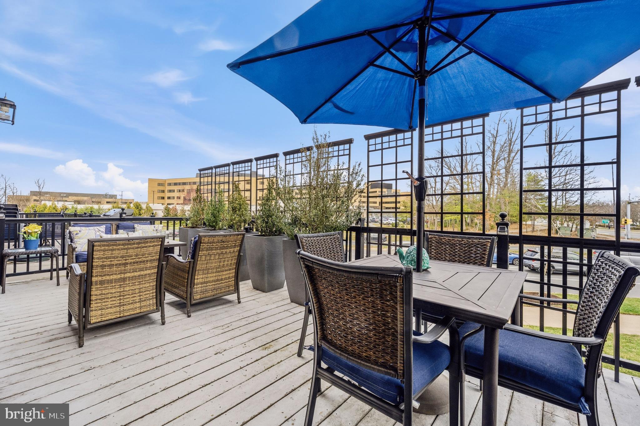 12138 Chancery Station Circle Reston, VA 20190 - Photo 21 of 54 a view of a roof deck with furniture