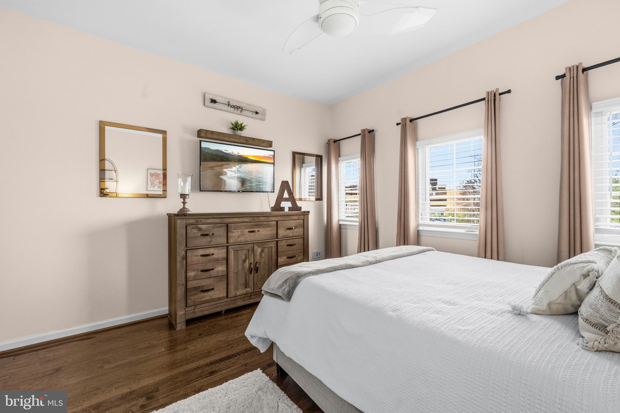 12138 Chancery Station Circle Reston, VA 20190 - Photo 28 of 54 a bedroom with a bed and a dresser