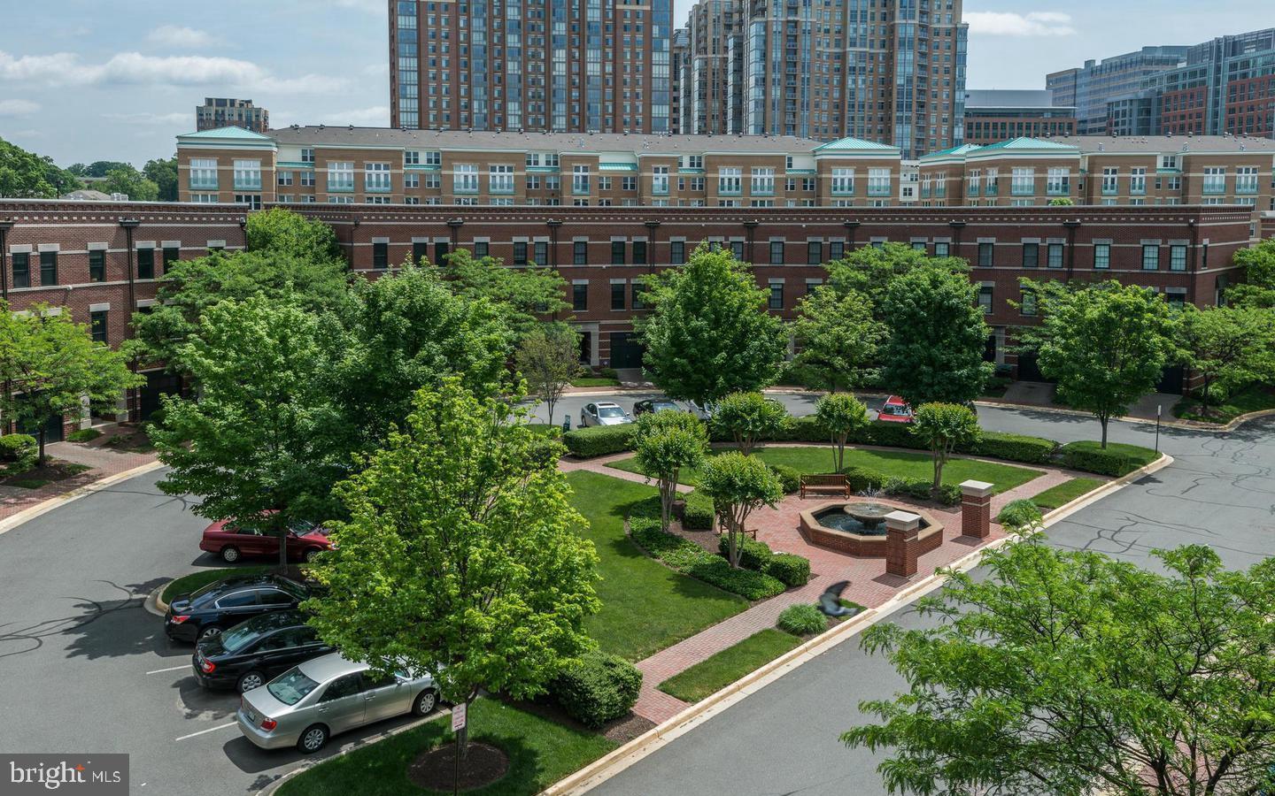 12138 Chancery Station Circle Reston, VA 20190 - Photo 35 of 54 an aerial view of a house with a garden view