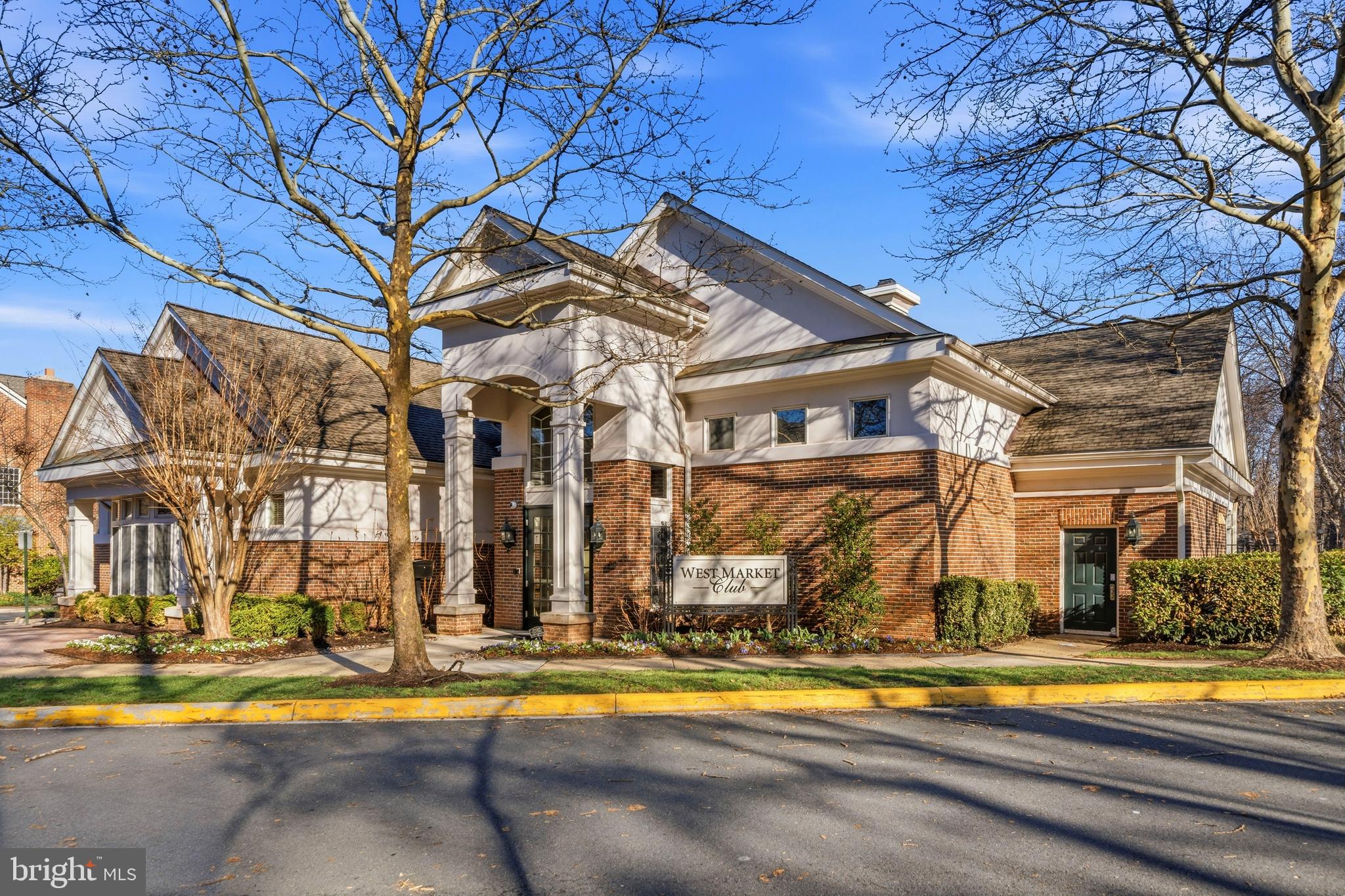 12138 Chancery Station Circle Reston, VA 20190 - Photo 36 of 54 a building with trees in front of it