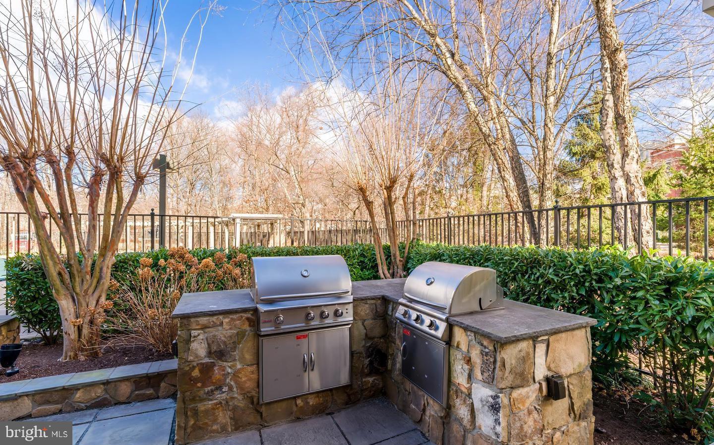 12138 Chancery Station Circle Reston, VA 20190 - Photo 40 of 54 a view of a patio with iron fence