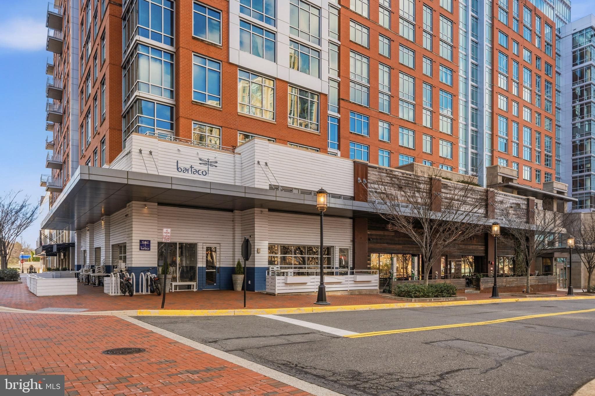 12138 Chancery Station Circle Reston, VA 20190 - Photo 49 of 54 a front view of an apartment building