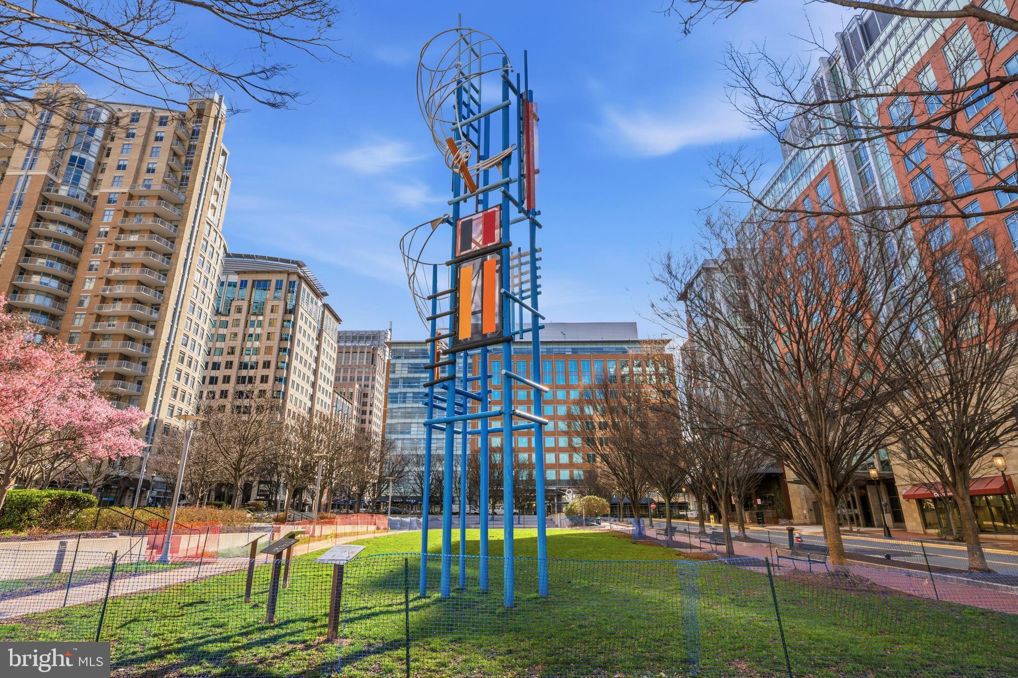 12138 Chancery Station Circle Reston, VA 20190 - Photo 51 of 54 a view of a big yard next to a building