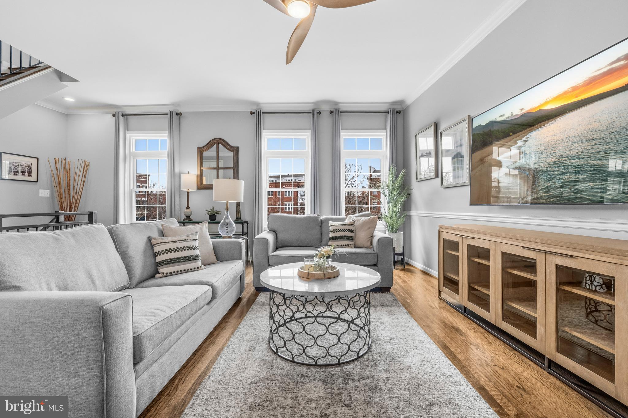 12138 Chancery Station Circle Reston, VA 20190 - Photo 10 of 54 a living room with furniture and a large window