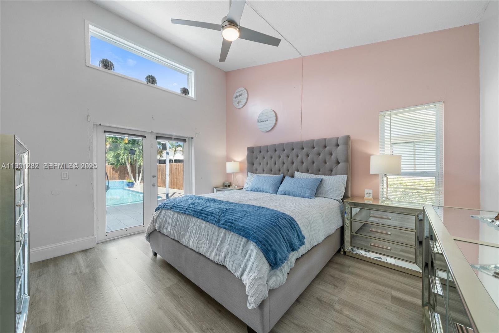 7461 Northwest 36th Street Lauderhill, FL 33319 - Photo 12 of 24 a bedroom with a bed and window