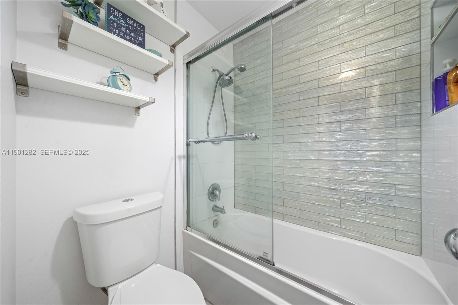 7461 Northwest 36th Street Lauderhill, FL 33319 - Photo 20 of 24 a bathroom with a toilet and a bathtub