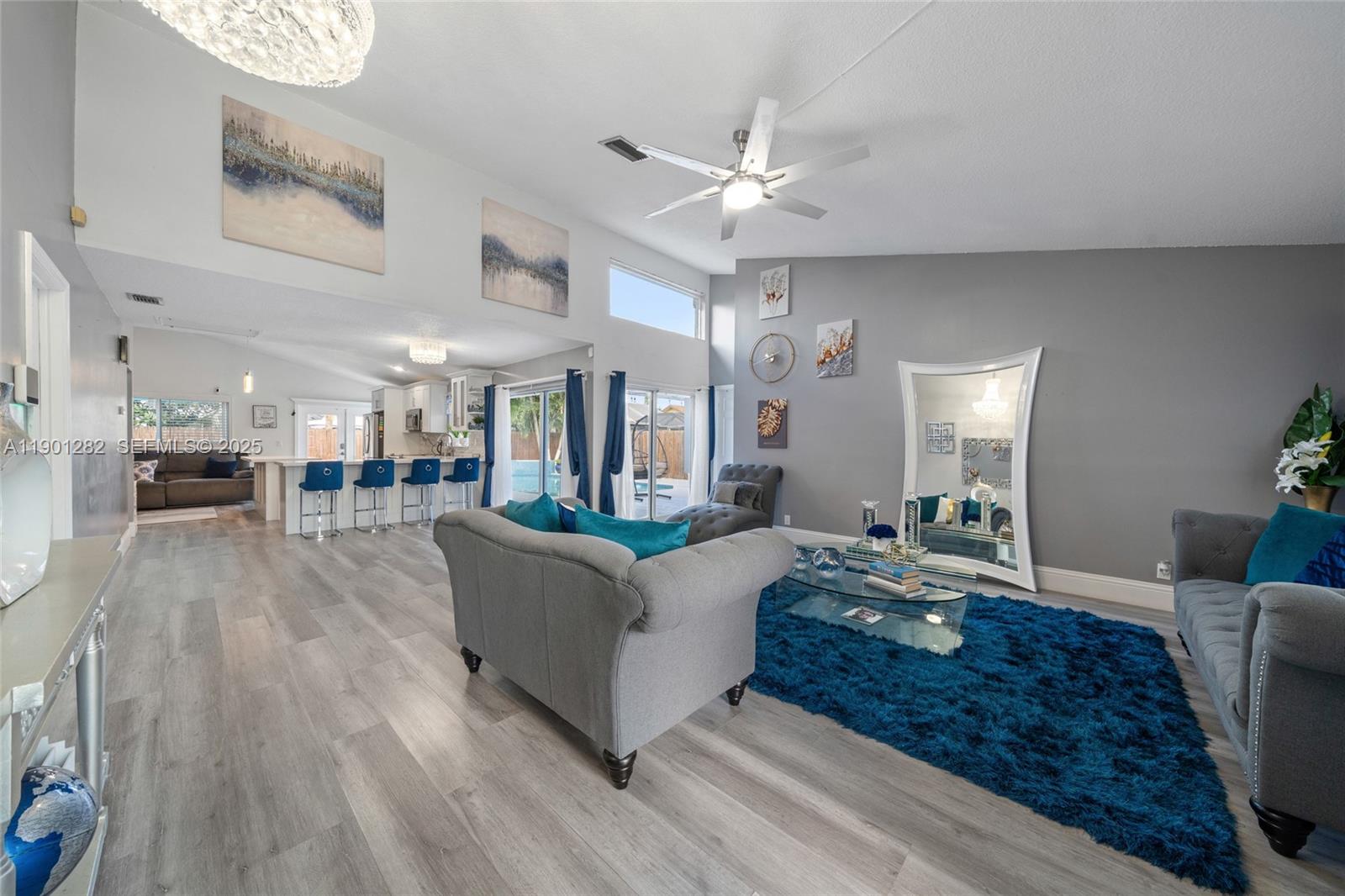 7461 Northwest 36th Street Lauderhill, FL 33319 - Photo 5 of 24 a living room with furniture and a table