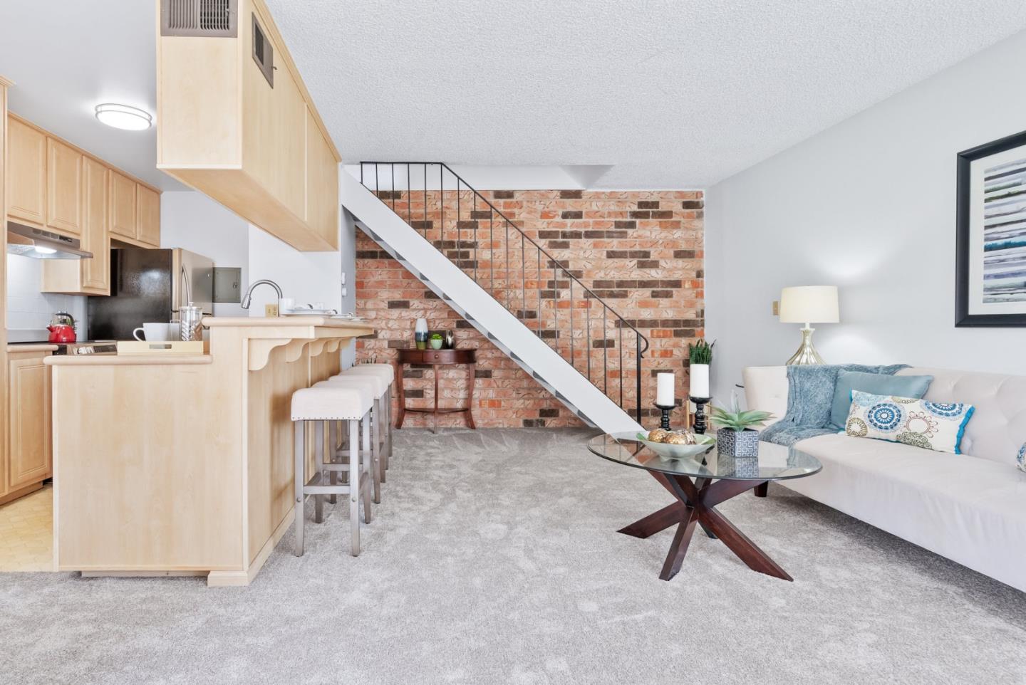 220 Watson Drive, Unit 2 Campbell, CA 95008 - Photo 13 of 34 a living room with furniture and a wooden floor