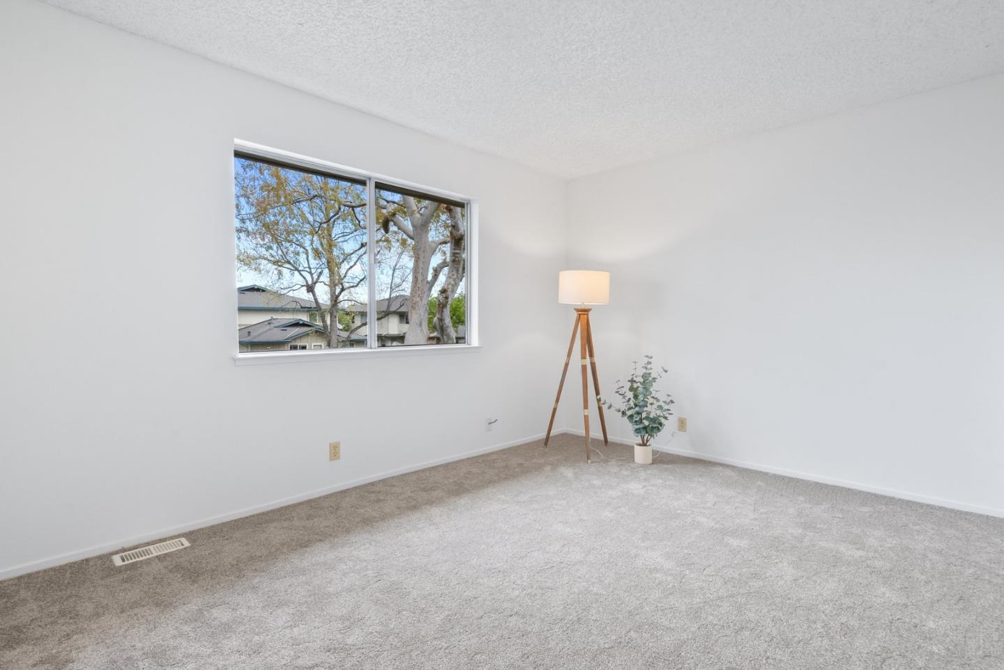 220 Watson Drive, Unit 2 Campbell, CA 95008 - Photo 14 of 34 an empty room with a window