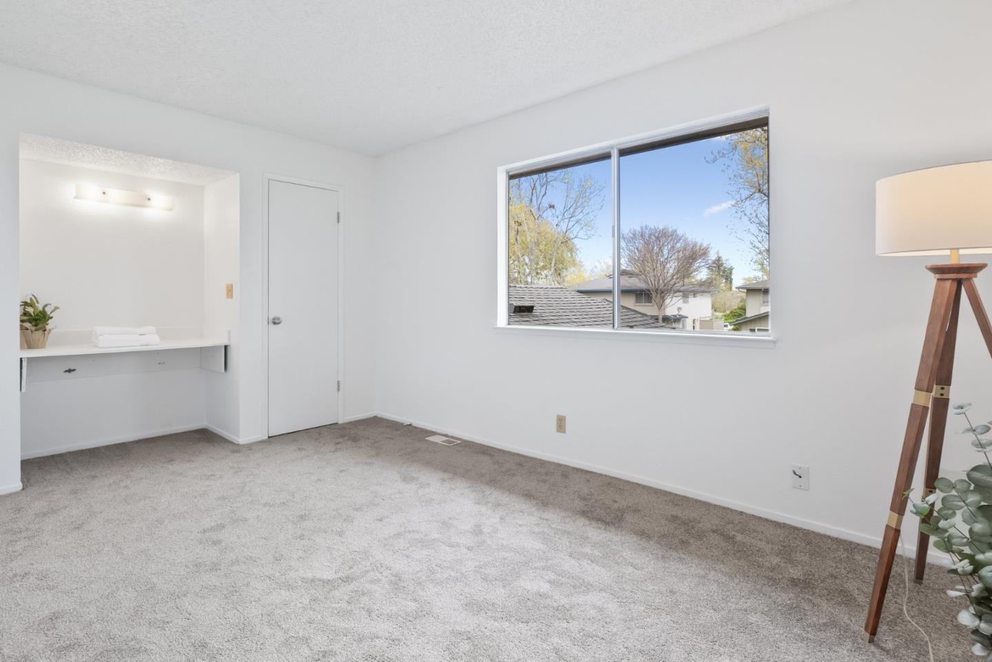 220 Watson Drive, Unit 2 Campbell, CA 95008 - Photo 16 of 34 a view of an empty room with a window