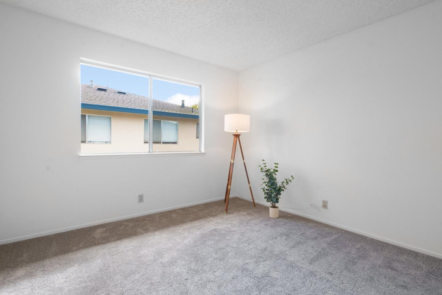 220 Watson Drive, Unit 2 Campbell, CA 95008 - Photo 17 of 34 a view of an empty room with a window