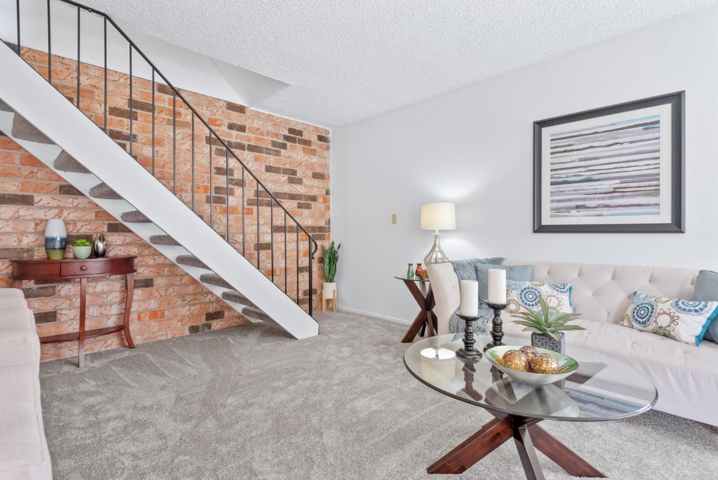 220 Watson Drive, Unit 2 Campbell, CA 95008 - Photo 5 of 34 a living room with furniture and stairs