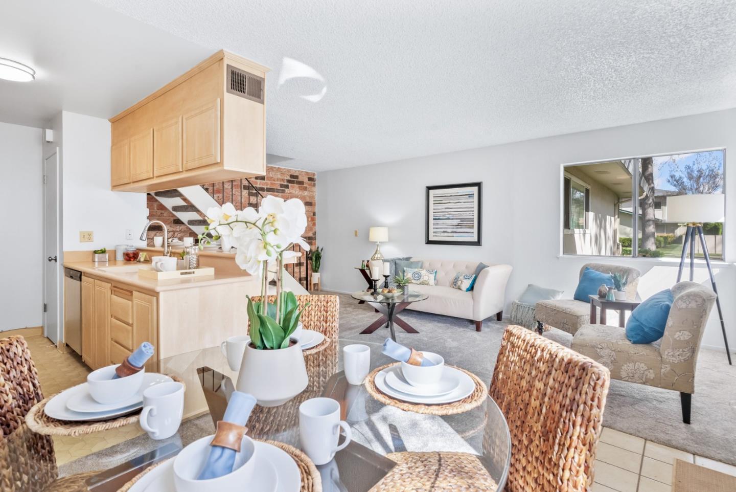 220 Watson Drive, Unit 2 Campbell, CA 95008 - Photo 8 of 34 a living room with furniture and a table
