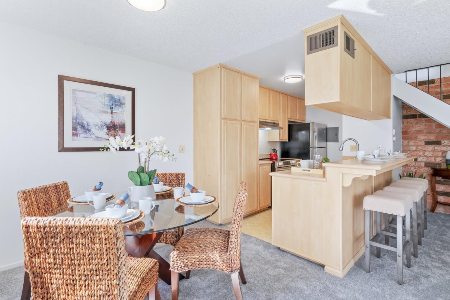 220 Watson Drive, Unit 2 Campbell, CA 95008 - Photo 9 of 34 a dining room with furniture a window and kitchen view