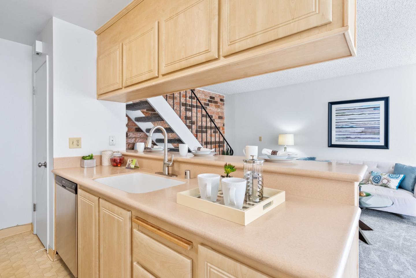 220 Watson Drive, Unit 2 Campbell, CA 95008 - Photo 10 of 34 a kitchen with a sink and cabinets