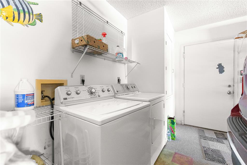 10987 Southwest 86th Terrace Ocala, FL 34481 - Photo 26 of 40 a utility room with dryer and washer