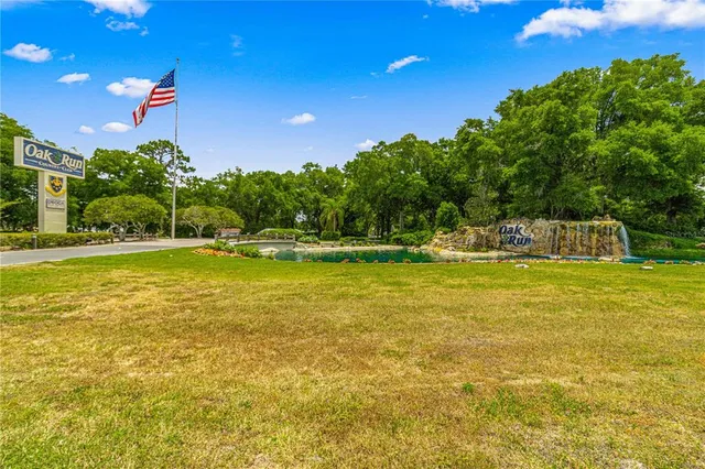 a view of a swimming pool with an outdoor space and seating area