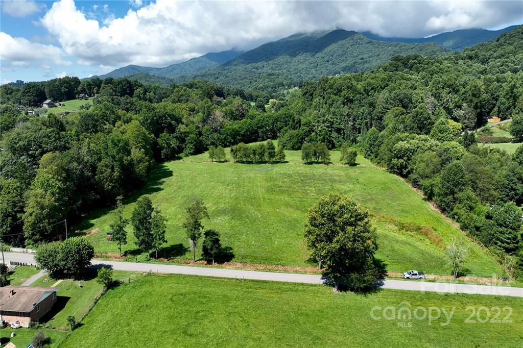 0 Green Valley Road Waynesville, NC 28786 - Photo 4 of 20 a view of a garden with a building in the background