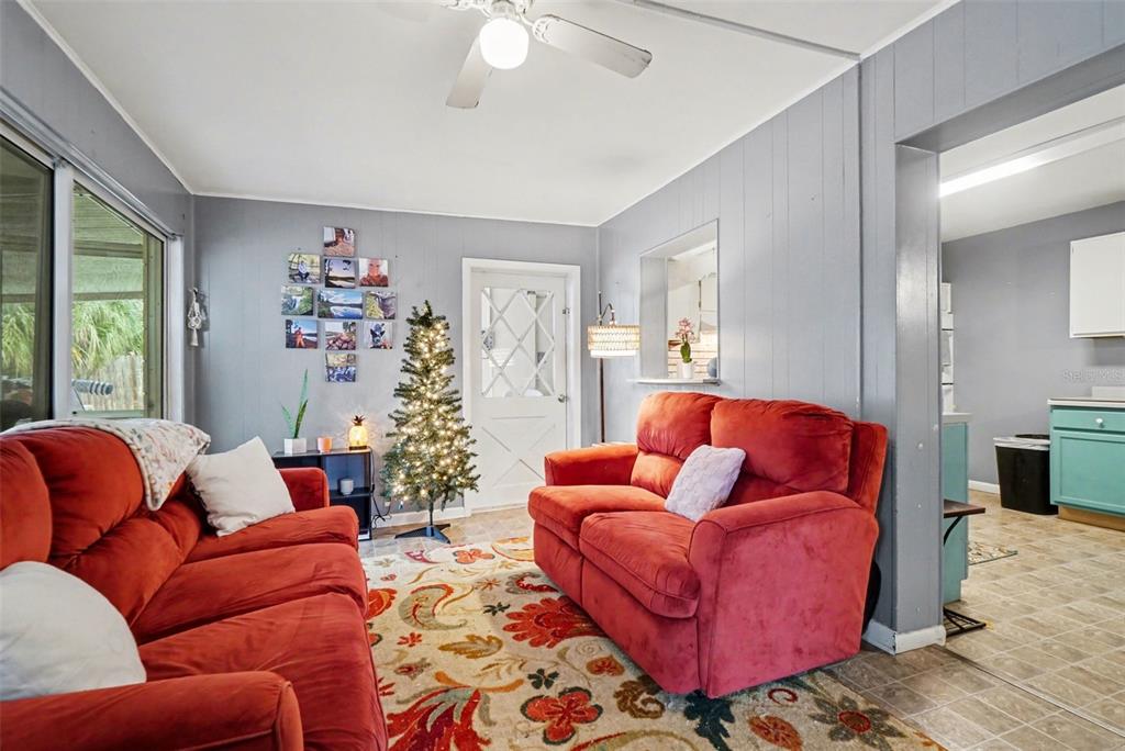 2300 Lake Road Fern Park, FL 32730 - Photo 17 of 25 a living room with furniture and a large window