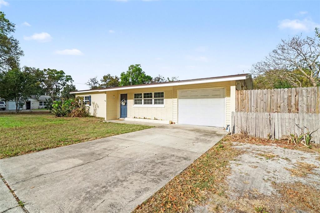 2300 Lake Road Fern Park, FL 32730 - Photo 2 of 25 front view of a house with a yard