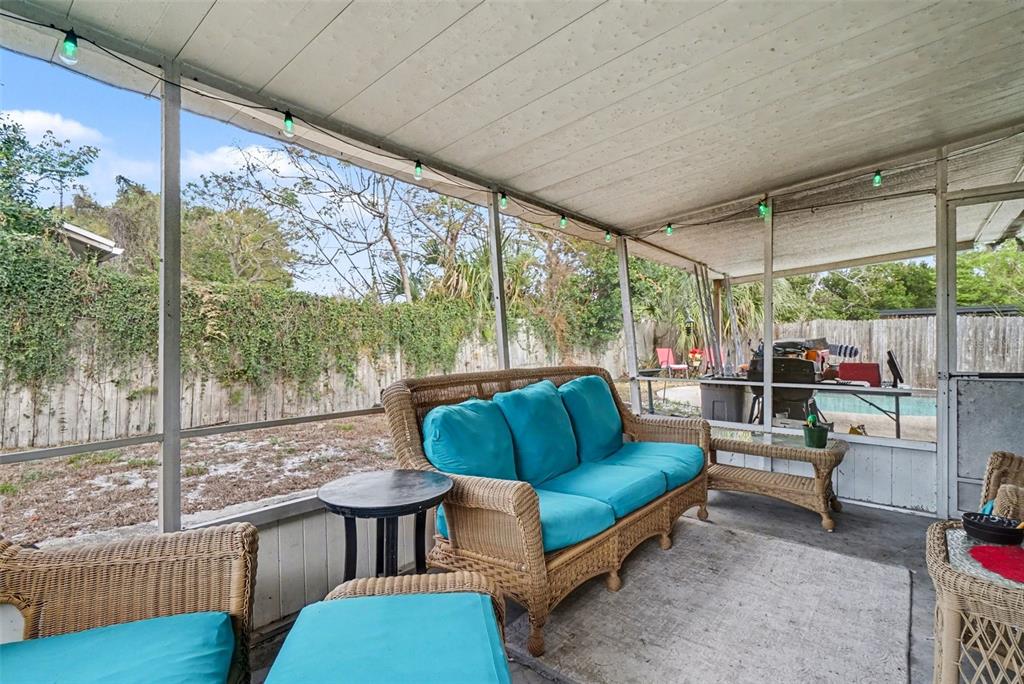 2300 Lake Road Fern Park, FL 32730 - Photo 21 of 25 a outdoor living space with patio couches and a coffee table