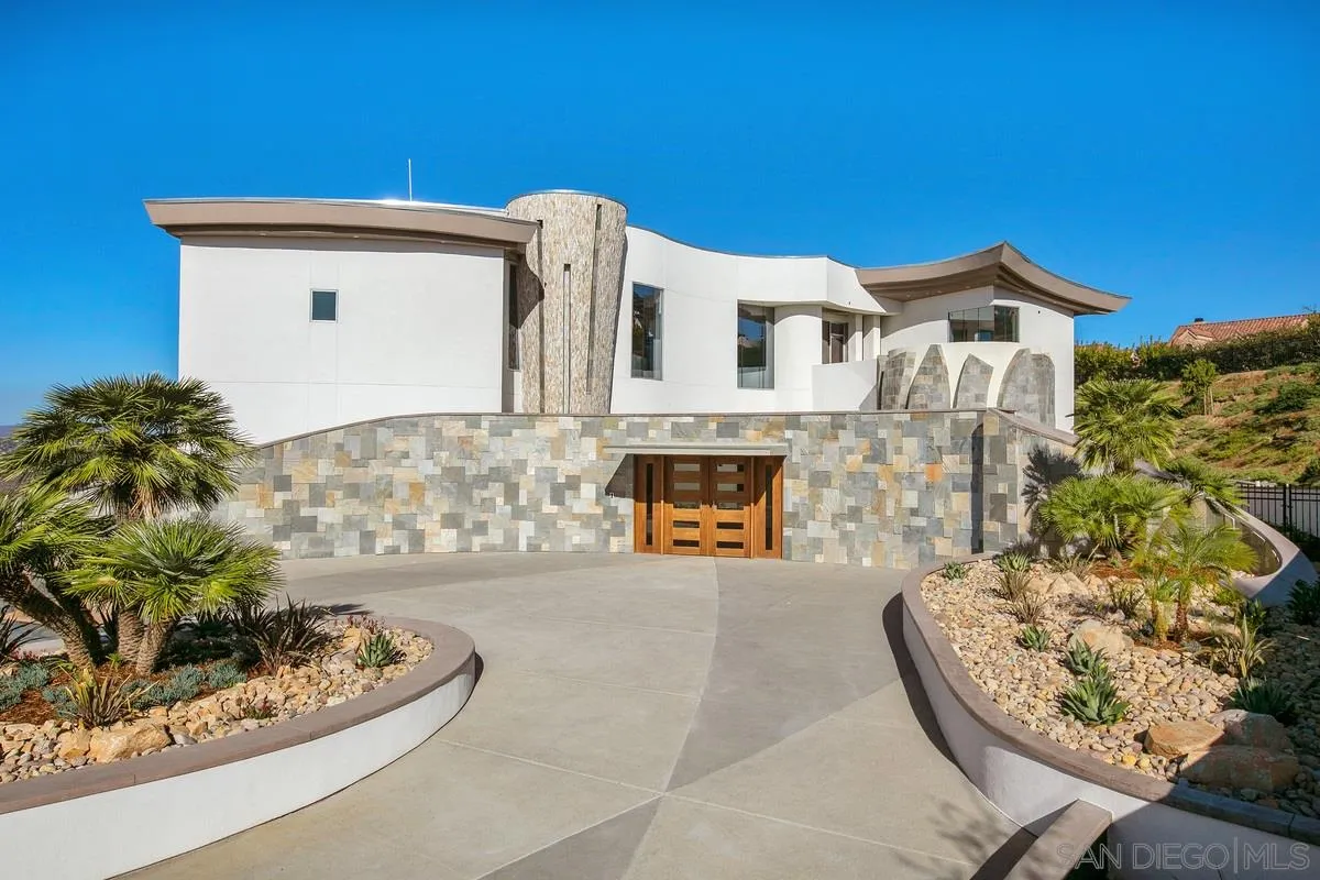 13220 Highlands Ranch Road Poway, CA 92064 - Photo 1 of 12 a front view of a house with a yard