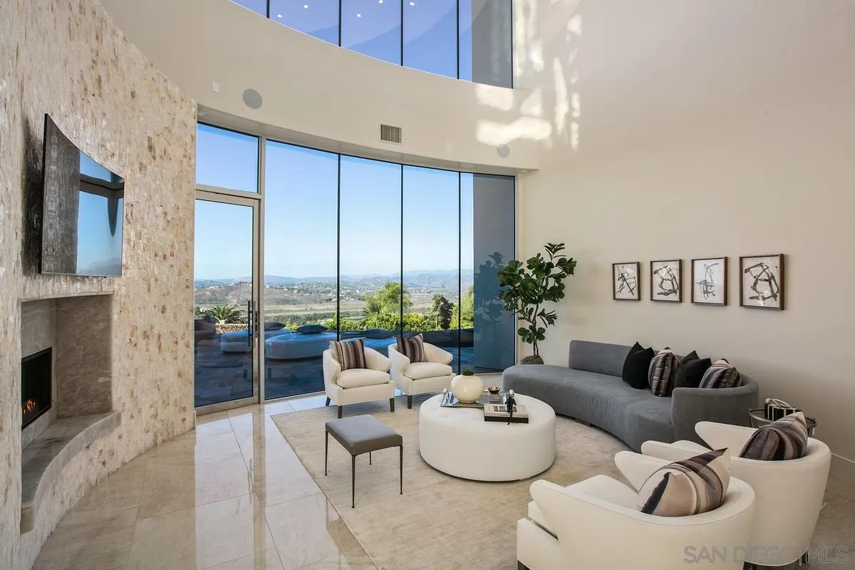 13220 Highlands Ranch Road Poway, CA 92064 - Photo 2 of 12 a living room with furniture and a floor to ceiling window