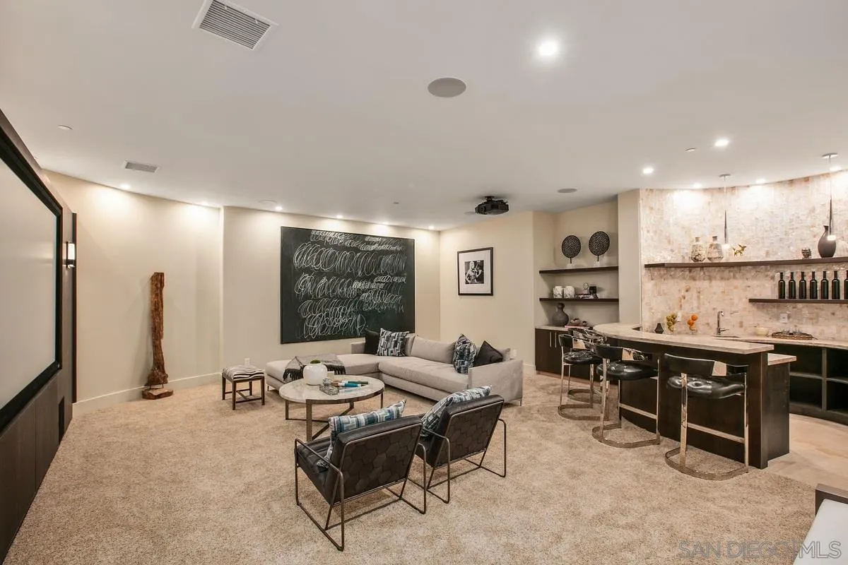 13220 Highlands Ranch Road Poway, CA 92064 - Photo 10 of 12 a living room with lots of furniture and kitchen view