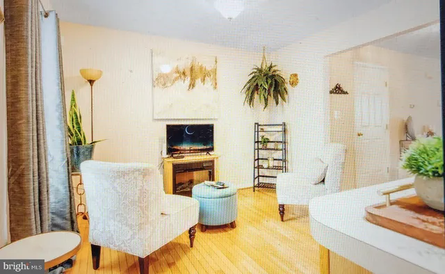 a living room with a couch and a flat screen tv