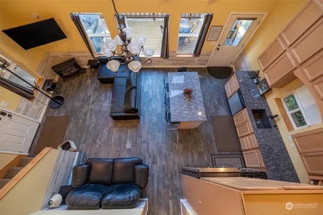 a view of roof deck with furniture