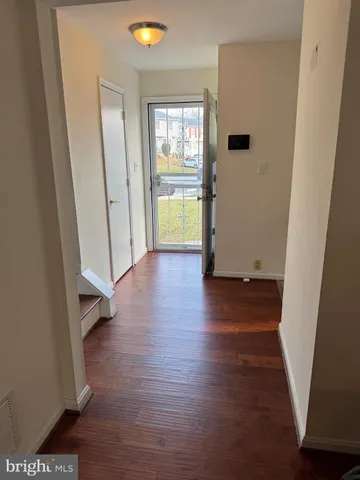 a kitchen with stainless steel appliances granite countertop a stove microwave and oven