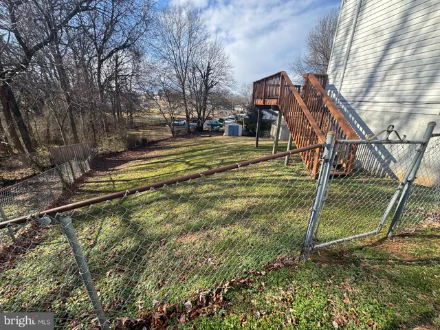a view of balcony with wooden floor