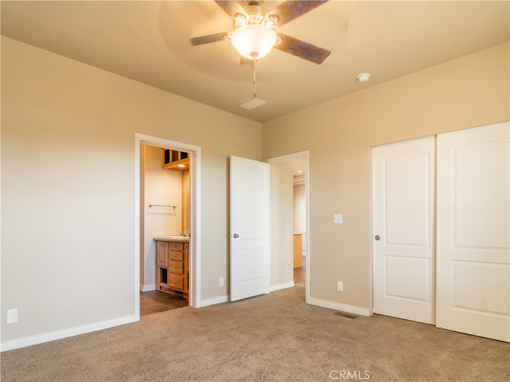 5548 Newland Road Paradise, CA 95969 - Photo 9 of 23 a view of a livingroom with a chandelier fan