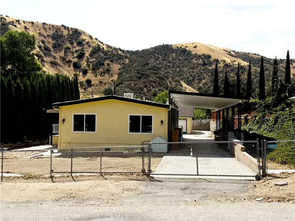 a house view with a outdoor space