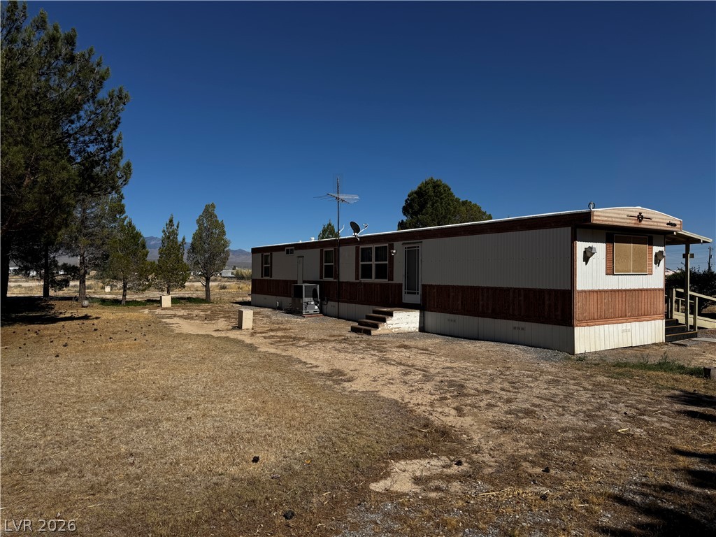 3090 Gally Road Pahrump, NV 89060 - Photo 1 of 20 Discover this spacious residence, offering comfortable living with ample outdoor space.