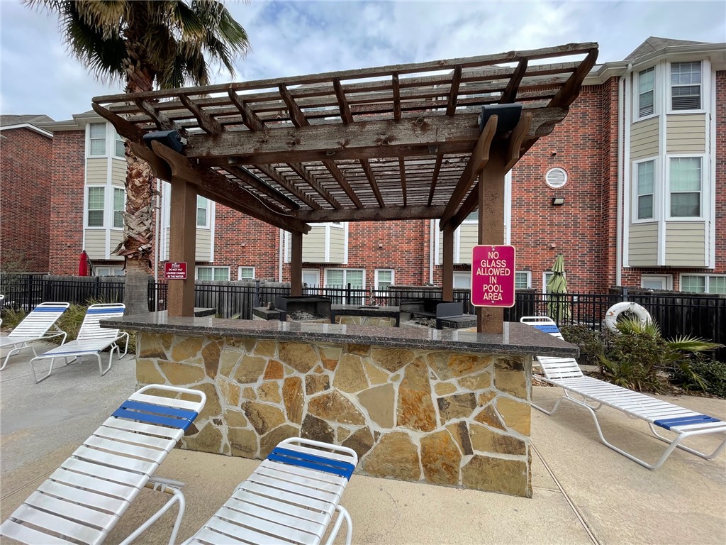 1198 Jones-Butler Road, Unit 2706 College Station, TX 77840 - Photo 17 of 17 a view of a swimming pool with sitting area