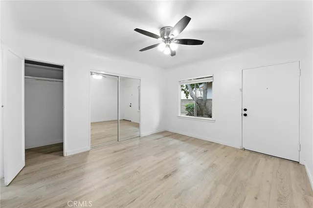 a kitchen with stainless steel appliances granite countertop a refrigerator sink and cabinets