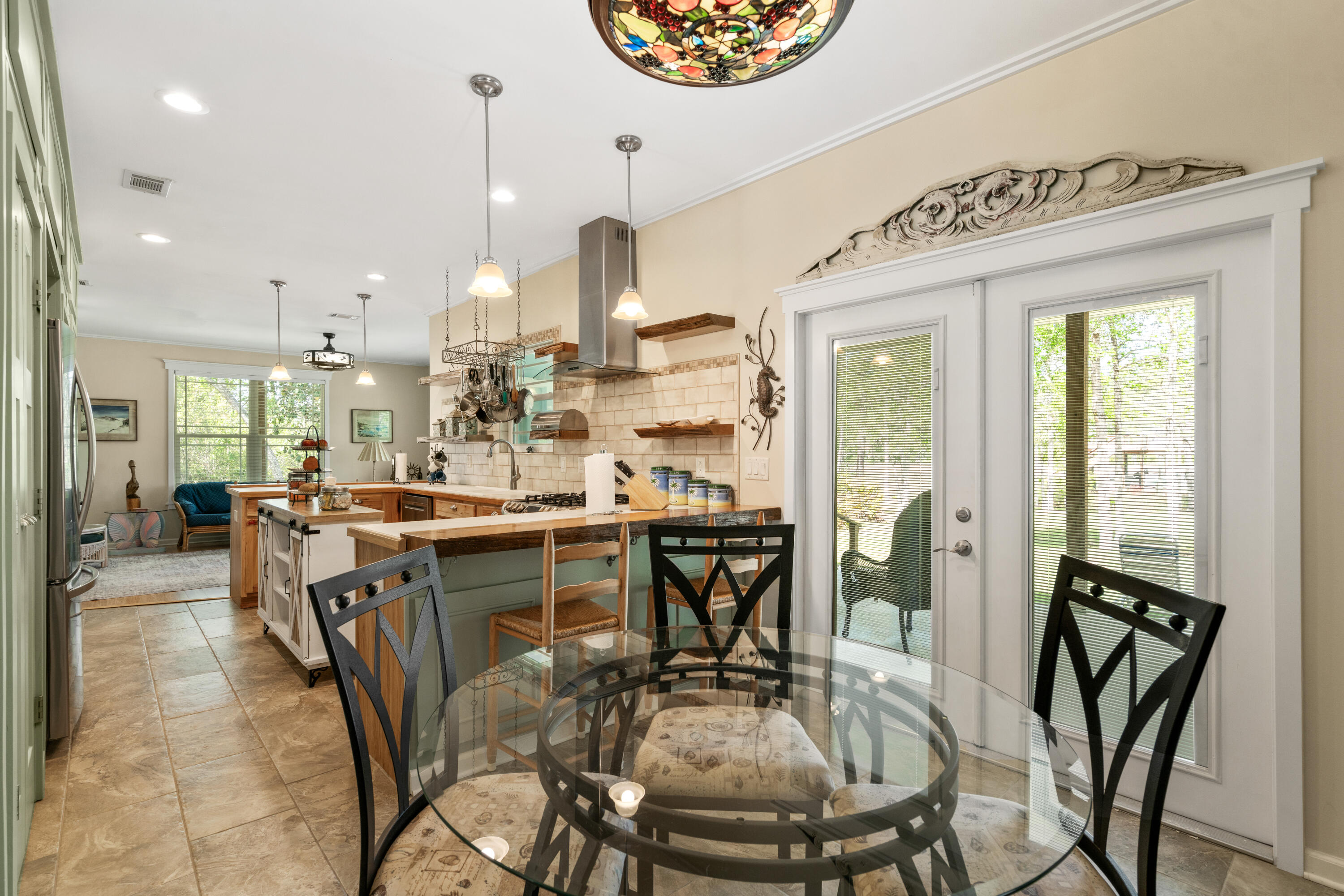 528 Bay Grove Road Freeport, FL 32439 - Photo 6 of 68 a dining room with furniture and wooden floor
