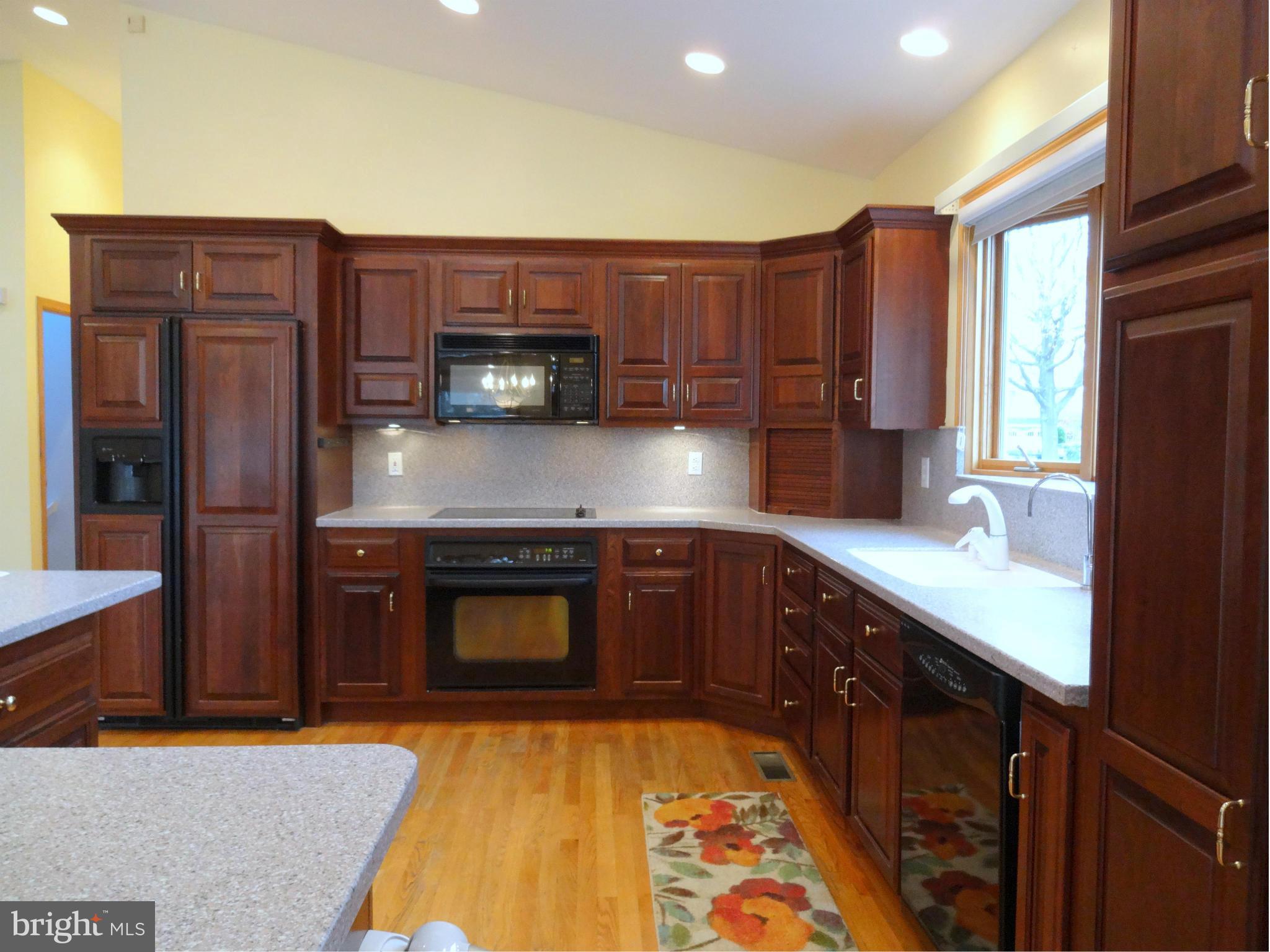 8096 Ventnor Road Pasadena, MD 21122 - Photo 8 of 30 Kitchen with Massive Corian Center Island