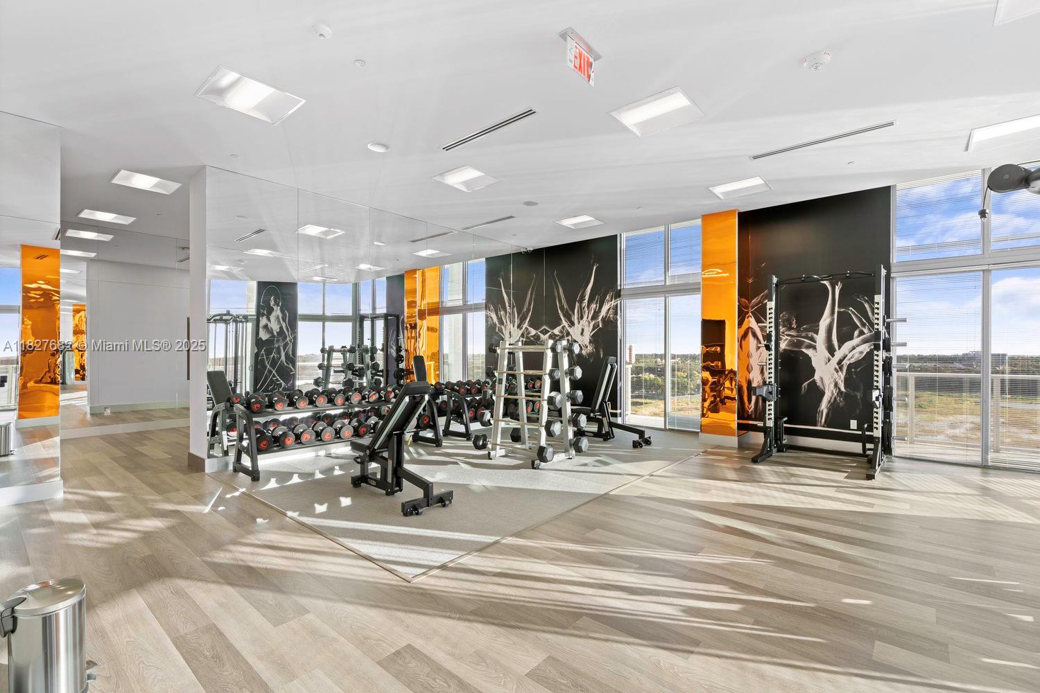 2000 Metropica Way, Unit 1605 Sunrise, FL 33323 - Photo 21 of 43 a view of a room with gym equipment