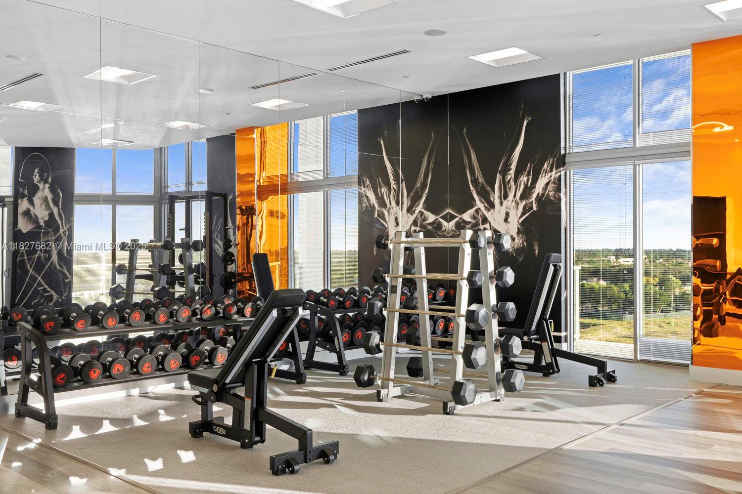 2000 Metropica Way, Unit 1605 Sunrise, FL 33323 - Photo 22 of 43 a view of a room with gym equipment