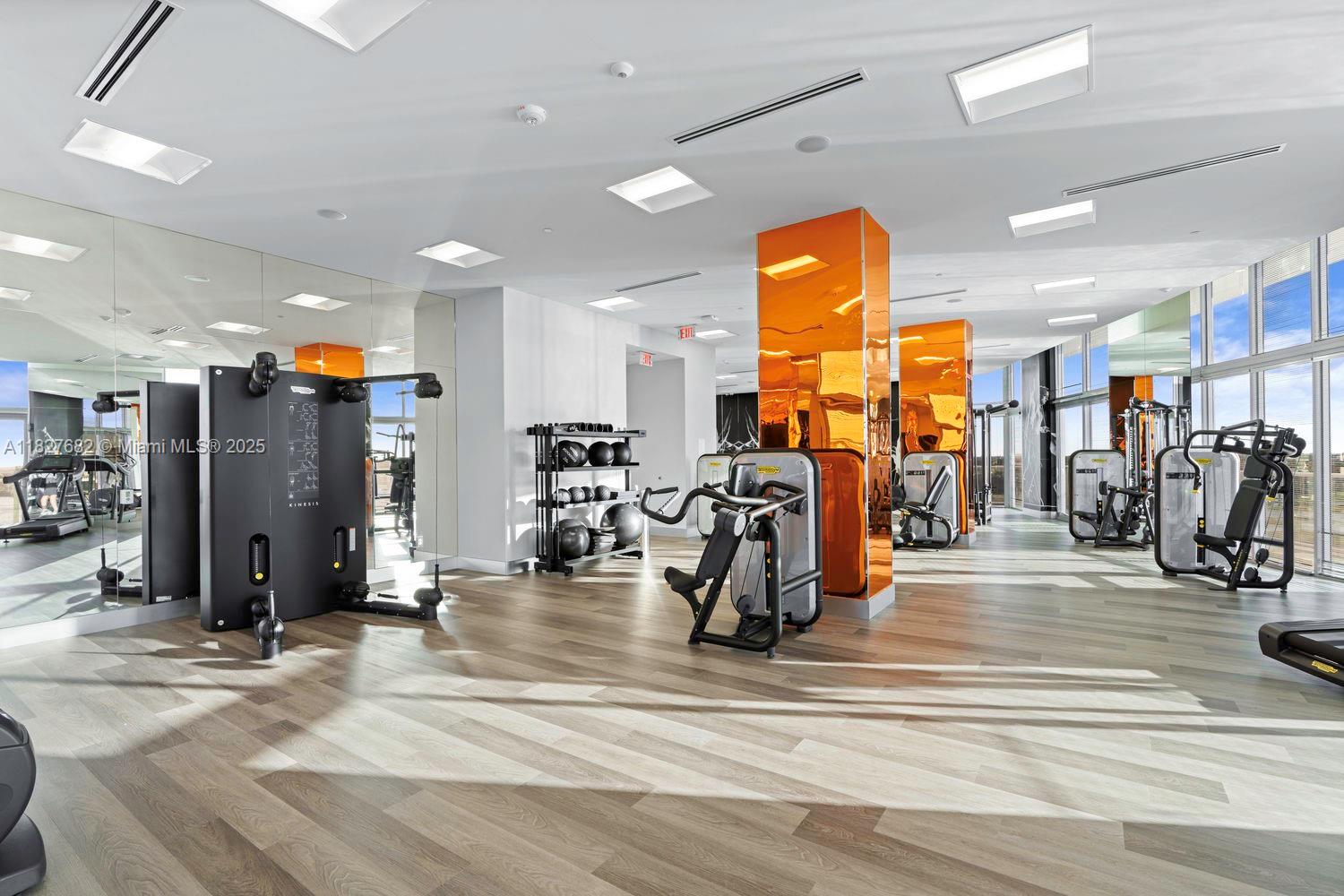 2000 Metropica Way, Unit 1605 Sunrise, FL 33323 - Photo 24 of 43 a view of a room with gym equipment