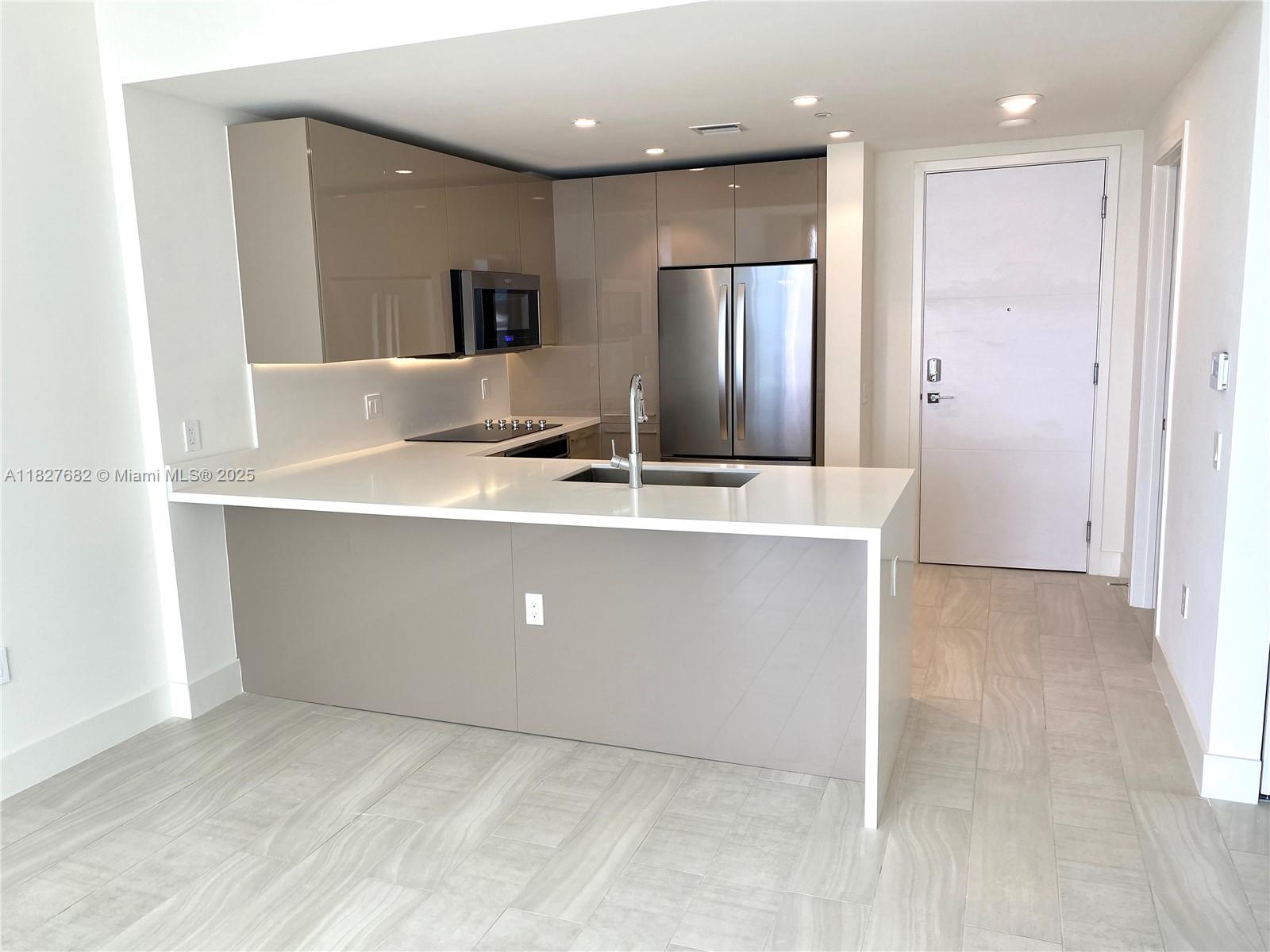 2000 Metropica Way, Unit 1605 Sunrise, FL 33323 - Photo 41 of 43 a view of cabinets