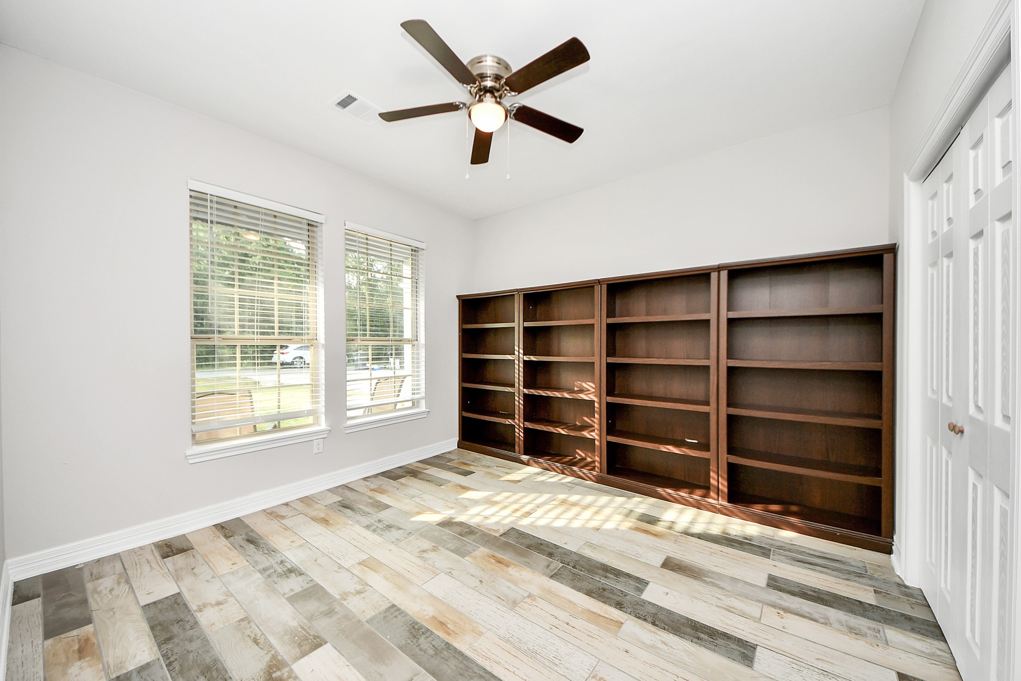 25450 Killarney Road Hempstead, TX 77445 - Photo 16 of 34 a view of an empty room with a window and a kitchen