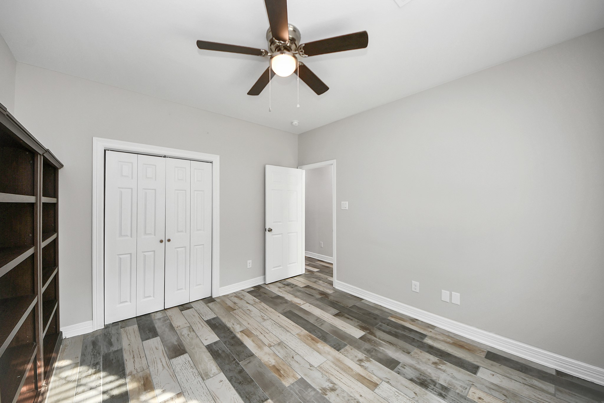 25450 Killarney Road Hempstead, TX 77445 - Photo 17 of 34 wooden floor in an empty room