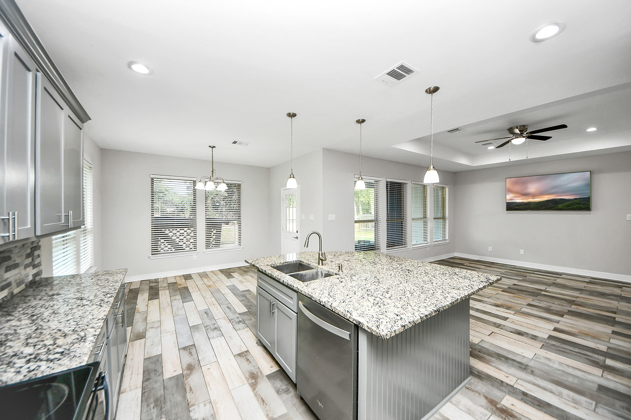 25450 Killarney Road Hempstead, TX 77445 - Photo 23 of 34 a bathroom with a granite countertop sink and a mirror
