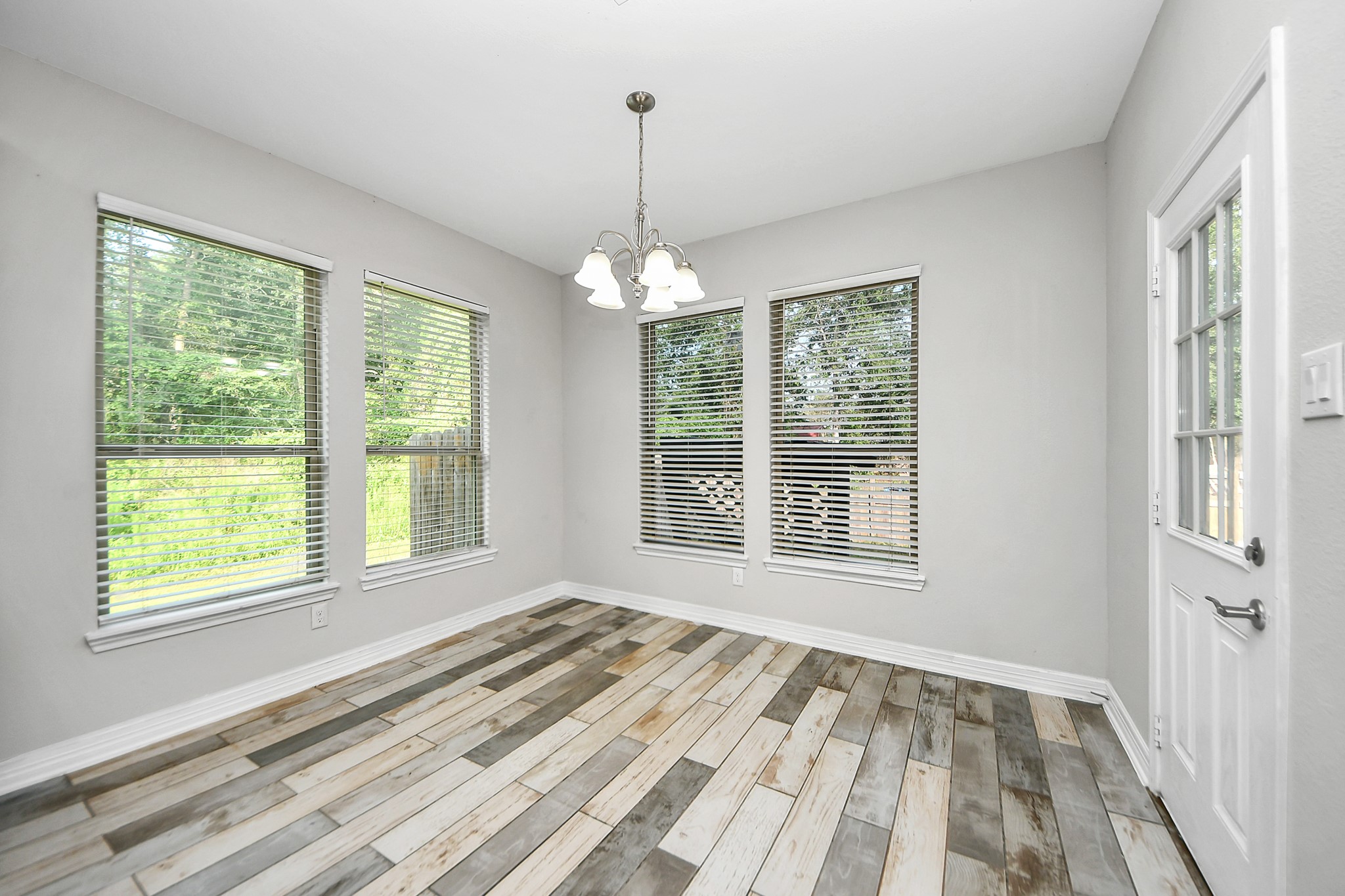 25450 Killarney Road Hempstead, TX 77445 - Photo 28 of 34 a view of a room with windows and chandelier