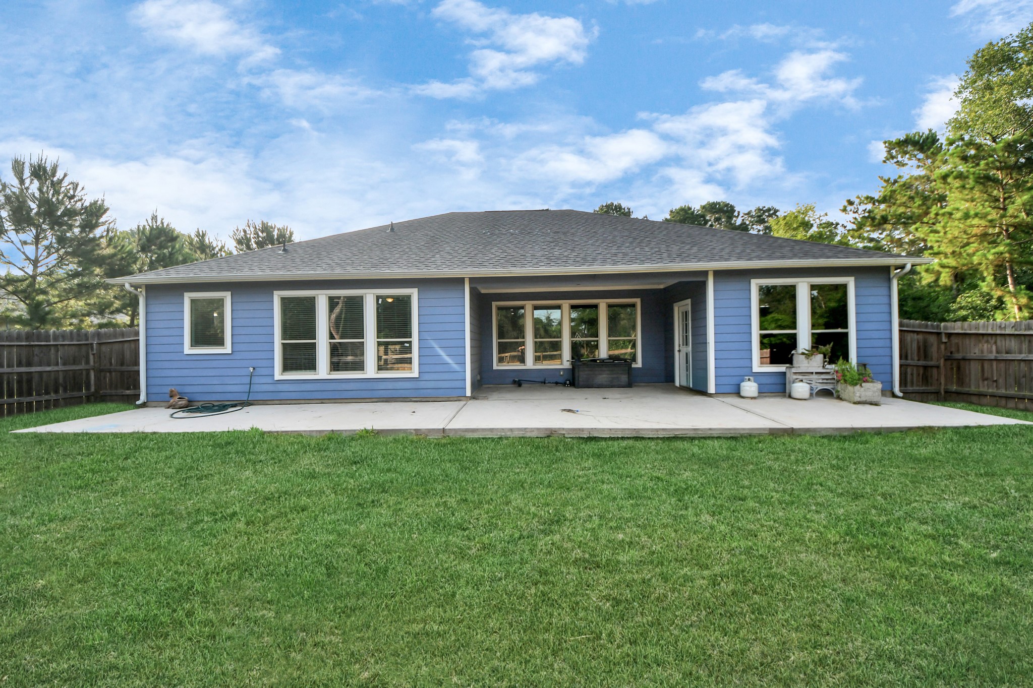 25450 Killarney Road Hempstead, TX 77445 - Photo 30 of 34 a view of a house with a backyard