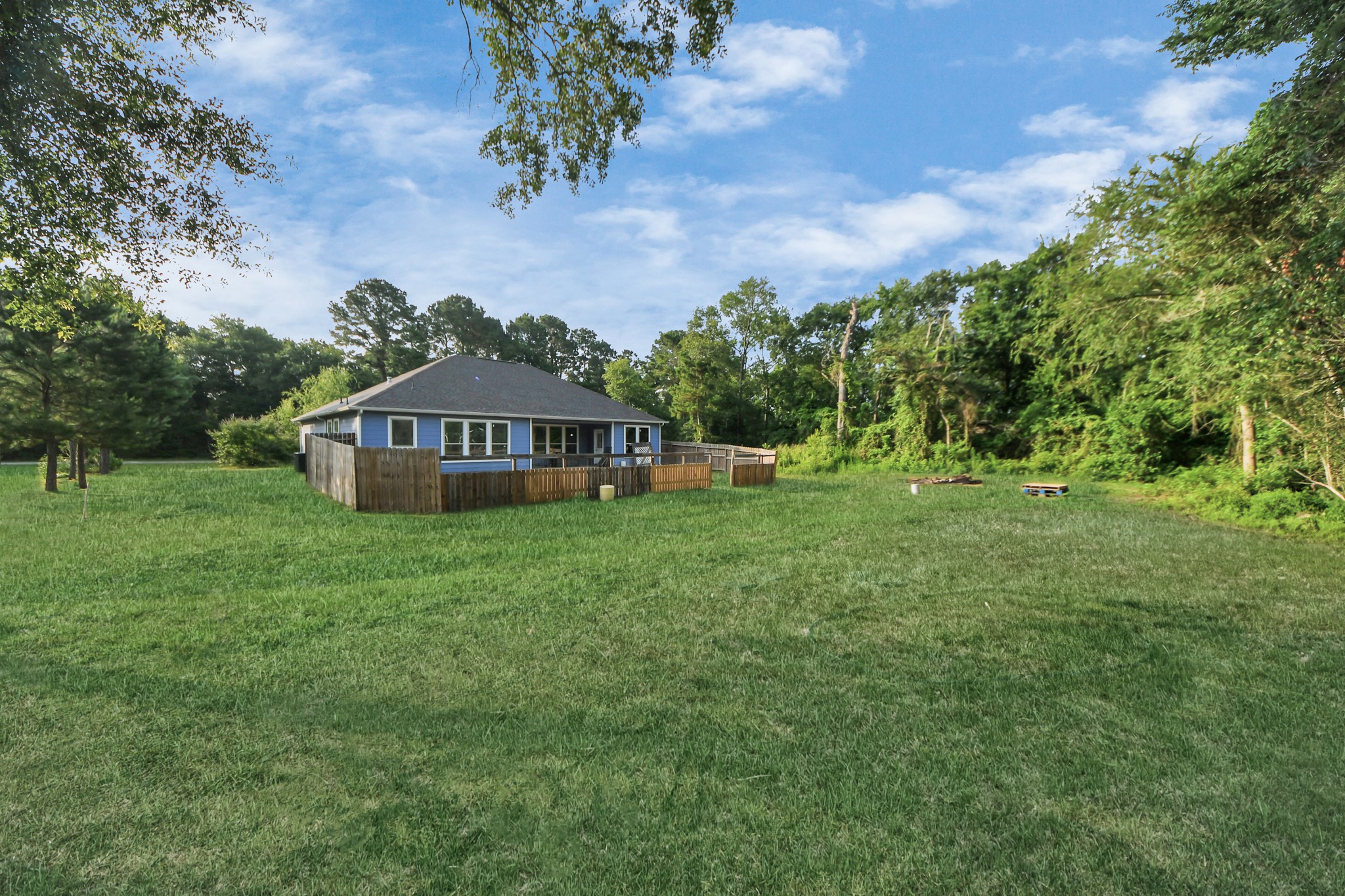 25450 Killarney Road Hempstead, TX 77445 - Photo 32 of 34 a front view of a house with garden